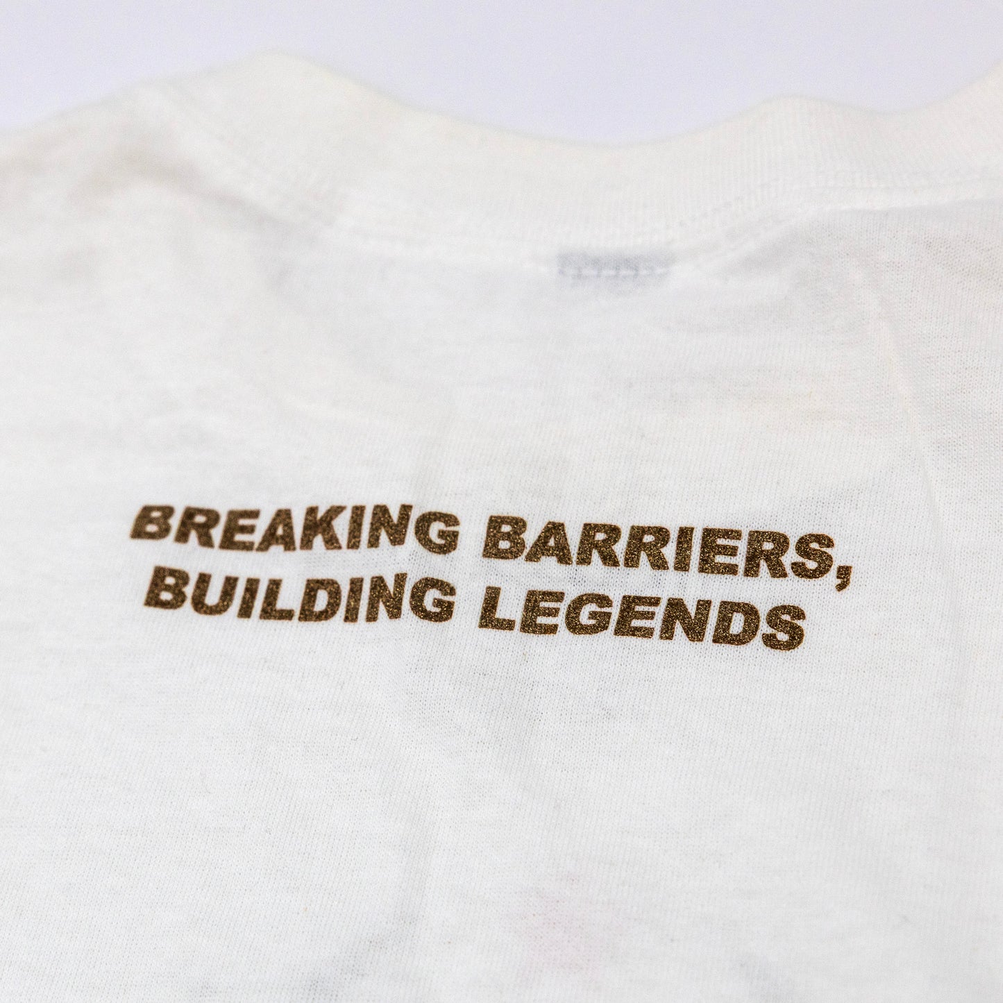 Breaking Barriers Building Legends Tee